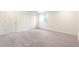 Finished basement with soft carpeting at 11124 Xanadu St, Commerce City, CO 80022