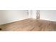 Bright bedroom featuring sleek wood flooring and a light-filled ambiance at 11124 Xanadu St, Commerce City, CO 80022