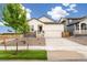 Charming single-Gathering home with a two-car garage and newly landscaped front yard at 11124 Xanadu St, Commerce City, CO 80022