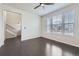 Inviting living room with hardwood floors and natural light streaming in from windows at 14176 Jackson St, Thornton, CO 80602