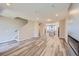 Spacious open-concept living space with modern finishes and plenty of natural light at 9627 Browns Peak Cir, Littleton, CO 80125