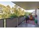 Cozy balcony space, potted plants, a table and chair, creating a tranquil outdoor retreat at 1085 N Lafayette St # 704, Denver, CO 80218