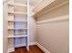 Well-organized walk-in closet with built-in shelving and ample space for storage and organization at 1085 N Lafayette St # 704, Denver, CO 80218