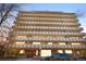 Mid-rise building with many balconies on an eleven story facade and brick facade at base at 1085 N Lafayette St # 704, Denver, CO 80218