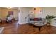 Comfortable living area showcasing hardwood floors, stylish decor, and open layout to dining area at 1085 N Lafayette St # 704, Denver, CO 80218