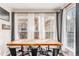Bright breakfast nook with large windows offering plenty of natural light, perfect for Gathering meals at 13421 Humboldt Way, Thornton, CO 80241