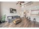 Spacious living area with high ceilings, sleek hardwood floors, and stylish decor throughout at 13421 Humboldt Way, Thornton, CO 80241