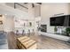 Expansive living space featuring an open floor plan, contemporary furnishings, and plenty of natural light at 13421 Humboldt Way, Thornton, CO 80241