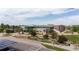 Exterior view of the school and surrounding area, complete with modern architecture and parking at 5338 Granby St, Denver, CO 80239