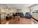 Spacious living room with hardwood floors, comfortable seating, and stylish decor at 5338 Granby St, Denver, CO 80239