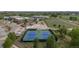 Community park featuring tennis courts, a school and multiple green spaces at 5338 Granby St, Denver, CO 80239