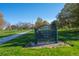 A welcoming park sign for Montbello Central Park with walking path surrounded by trees at 5338 Granby St, Denver, CO 80239