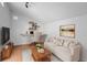 Well-lit office featuring hardwood floors, modern decor, and comfortable furniture at 3368 S Corona St, Englewood, CO 80113