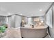 Spacious living room featuring modern decor, hardwood floors, and plenty of natural light at 7902 Meade St # A10, Westminster, CO 80030