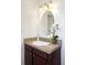 Bathroom vanity features a granite countertop, and bright lighting fixture at 3408 S Kittredge St, Aurora, CO 80013