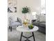 Cozy living area featuring neutral colors, decorative accents, and a comfortable seating arrangement at 3408 S Kittredge St, Aurora, CO 80013