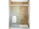 Shower stall with glass doors and earth-toned tiles at 3408 S Kittredge St, Aurora, CO 80013