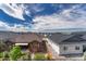 Fenced backyard view showcasing the surrounding neighborhood at 2775 Morningbird Ln, Castle Rock, CO 80109