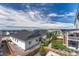 View of the back and side yards plus the surrounding neighborhood at 2775 Morningbird Ln, Castle Rock, CO 80109