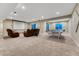 Finished basement area with a ping pong table and comfortable seating area at 2775 Morningbird Ln, Castle Rock, CO 80109