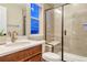 Beautiful bathroom features stylish vanity, sink, modern fixtures, and a luxurious glass shower at 2775 Morningbird Ln, Castle Rock, CO 80109