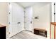 Functional entryway with storage closets and a convenient bench for seating at 2775 Morningbird Ln, Castle Rock, CO 80109