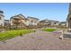 Spacious backyard with gravel, grass, and privacy fencing at 1403 Hart Ln, Elizabeth, CO 80107