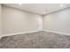 Bright, neutral bedroom offers plush gray carpeting and fresh white trim at 1403 Hart Ln, Elizabeth, CO 80107