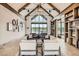 Clubhouse interior with beamed ceilings and stylish decor at 1403 Hart Ln, Elizabeth, CO 80107