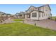 Exterior showcasing yard, gravel, and privacy fence at 1403 Hart Ln, Elizabeth, CO 80107