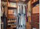 Well-organized walk-in closet with custom shelving and ample storage space at 10657 Cherrybrook Cir, Highlands Ranch, CO 80126