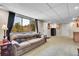 Spacious basement with large windows offering scenic views at 29551 Dorothy Rd, Evergreen, CO 80439