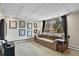 Basement area offering a large window, neutral carpet, and comfortable couch at 29551 Dorothy Rd, Evergreen, CO 80439