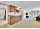 Finished basement with carpet, cabinets, and a walk-in shower at 29551 Dorothy Rd, Evergreen, CO 80439