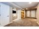 Finished basement with TV area, storage, and extra rooms at 1626 Adobe Pl, Highlands Ranch, CO 80126