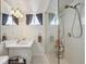 Bathroom with a walk-in shower, double sink vanity, and great natural lighting at 2141 W Gill Pl, Denver, CO 80223