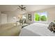Bright bedroom with large windows and a cozy seating area at 6364 S Walden Ct, Aurora, CO 80016