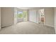 Room featuring light colored carpet, closet and bathroom at 6364 S Walden Ct, Aurora, CO 80016