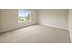 Empty room with large window. Great natural light and relaxing neighborhood view at 6364 S Walden Ct, Aurora, CO 80016