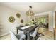 Well-decorated dining area featuring stylish accents, an open layout, and ample natural light at 6364 S Walden Ct, Aurora, CO 80016