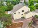 Aerial view showcasing the house, mature trees, landscaping, and proximity to neighboring properties at 6364 S Walden Ct, Aurora, CO 80016