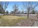Wide backyard featuring a shed and white fence, offering a large outdoor area at 4585 Garrison St, Wheat Ridge, CO 80033