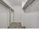 Walk-in closet with shelving providing ample storage space at 14192 E Colorado Dr # 102, Aurora, CO 80012