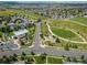 Wide aerial view of neighborhood including pool and park at 11300 Whooping Crane Dr, Parker, CO 80134