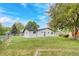 Expansive backyard featuring a well-maintained lawn, offering plenty of space for outdoor activities at 6882 Quail St, Arvada, CO 80004