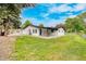 Spacious backyard with a patio area, perfect for outdoor entertaining and relaxation at 6882 Quail St, Arvada, CO 80004