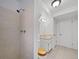 Compact basement bathroom with tiled shower, a granite-topped vanity, and a toilet at 206 River Rd, Platteville, CO 80651