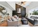 Spacious living room features vaulted ceilings, fireplace, and neutral furniture at 5616 S Kenton Ct, Englewood, CO 80111