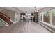 Open floor plan featuring a living area adjacent to the modern kitchen with stainless steel appliances at 2008 S Galapago St, Denver, CO 80223