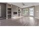 Spacious living room showcases a modern fireplace, built-in shelving, and neutral-toned walls at 2008 S Galapago St, Denver, CO 80223